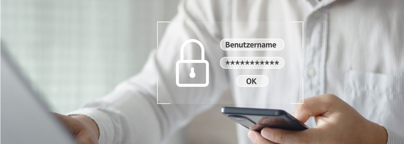 Log-in Bereich der Deutsche Factoring Bank Person im weißem Hemd sitzt vor einem Laptop und hat ein schwarzes Smartphone in der Hand. Über das Bild ist ein Schloss Symbol mit Benutzername und Passwort gelegt. Dies soll den Login Bereich zeigen.